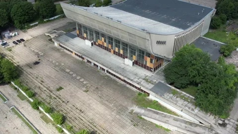 Drone Pulling Away From Abandoned Vilnius Palace of Concerts and Sports Stock Footage 324706834
