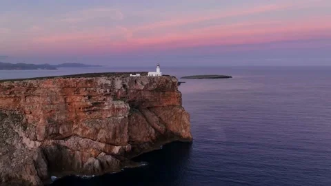 drone-pulling-away-from-clifftop-with-li-stock-video-pond5