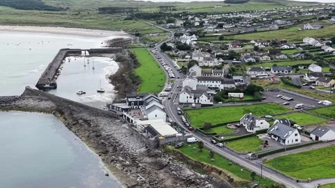 Drone pulling away the coastal village go Mullaghmore, County Sligo, Ireland. Stock Footage 341732844