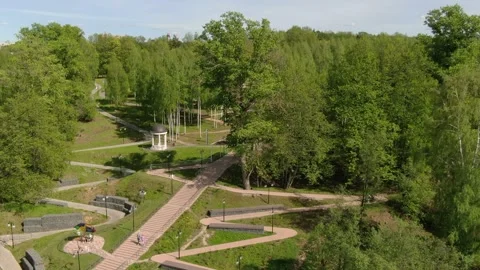 Drone pulling back above park with gazebo Stock Footage 331740493