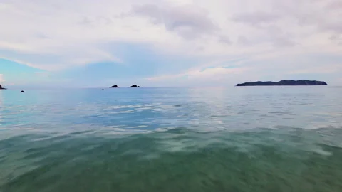 Drone Pulling Back From Sea Over Tide To Nacpan Beach Stock Footage 193974337