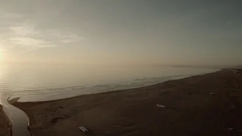 Drone Pulling through the beach 動画素材 73969015