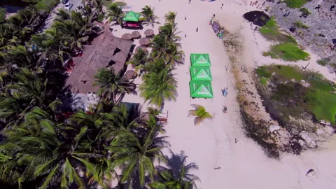 Drone Pulls Back and Rises over a Pacific Resort Beach Video stock 347152498