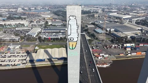 Drone pulls back from PAM bird graffiti on Bolte Bridge Stock-Footage 339078239