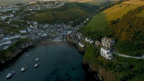 Drone pulls back reveal the harbor of Port Isaac Stock Footage 95826728
