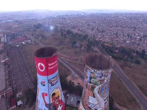 Drone pulls back smoothly to wide shot of Soweto Towers, Johannesburg Vídeo Stock 80768592