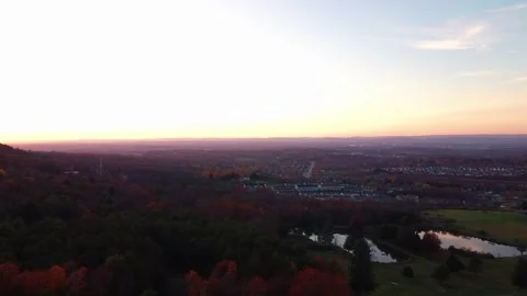 Drone Purple Sunset Sky Over Rural Town Stock Footage 143012595
