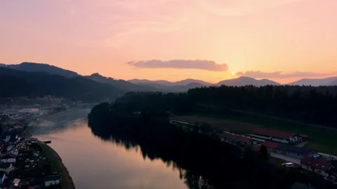 Drone push in along river at sunset Stock Footage 330545546