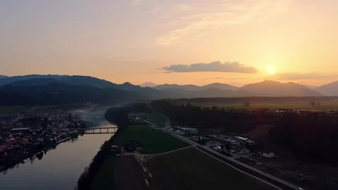 Drone push in along river valley at sunset Stock Footage 330545309
