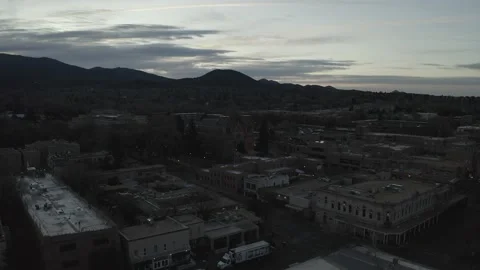 Drone push in at dusk over the town of Santa Fe Stock Footage 167660271