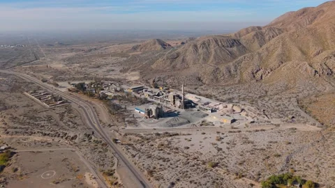 Drone push-in establishing shot of Loma Negra cement plant in San Juan Argentina Stock Footage 342053507