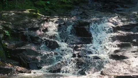Drone push in to extreme close up of Salto Guatambú waterfall rock cascade Stock-Footage 334777964
