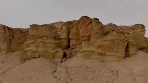 Drone push forward and pull back desert mountain shot Stock Footage 331952779