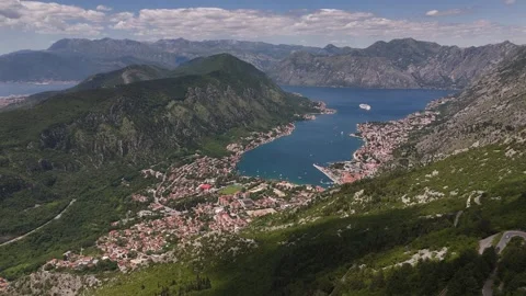 Drone Push Forward over Bay of Kotor and Serpentine Winding Road, 4K Stock Footage 337180533