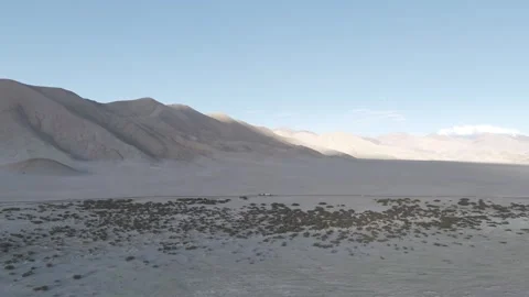 Drone Push In Over Dry Ladakh Valley with Sunlight Patches on Mountains Over Vídeos de archivo 335760811