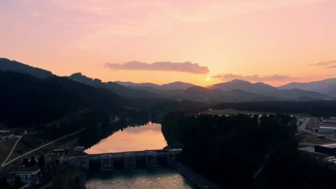 Drone push in over hydroelectric dam and river Video stock 330545831