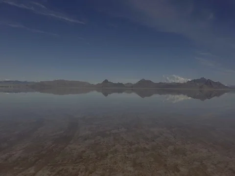 Drone push over lake with mountain reflections 動画素材 80745281