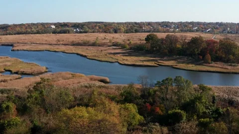 Drone push in over river in staten island model air field Stock Footage 229350162