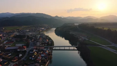 Drone push in over river valley at sunset Stock Footage 330544728