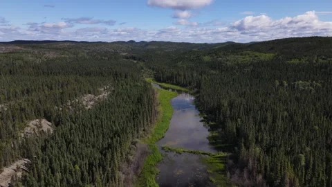 Drone push up a river deep in the backcountry of Canada Stock Footage 247580949