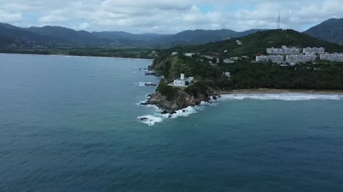 Drone Push Shot Looking Down on White Island Lighthouse Stock Footage 273576713