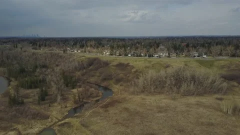 Drone push in on a small road in Canada with skyline in the background Video stock 167565003