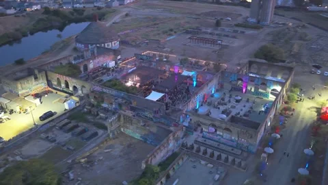Drone Push Toward Concert Stage in Graffiti Ruins at Blue Hour, July 4th, 4K Vídeo Stock 338307035