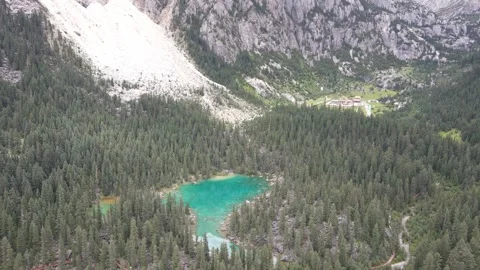 Drone Push Toward Emerald Alpine Lake in Cuopu Valley Sichuan China Stock Footage 330279801