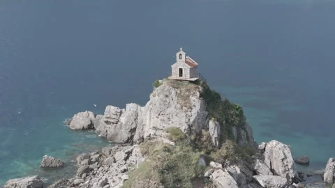 Drone Push Toward Saint Nedjelja Church with Waves and Seagulls – Montenegro Stock-Footage 310335304