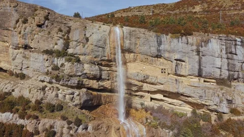 Drone Push In Toward Yebra de Basa Hermitages and Waterfall Stock Footage 345821895