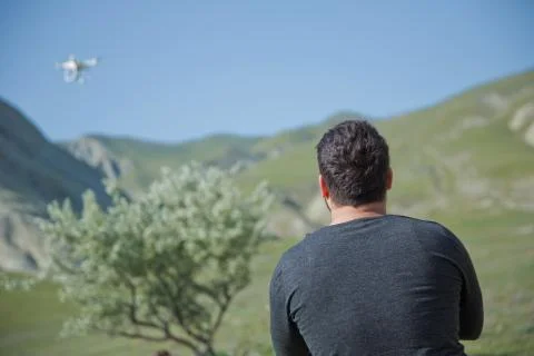 Drone quad copter with high resolution digital camera on the sky .White drone Stock Photos