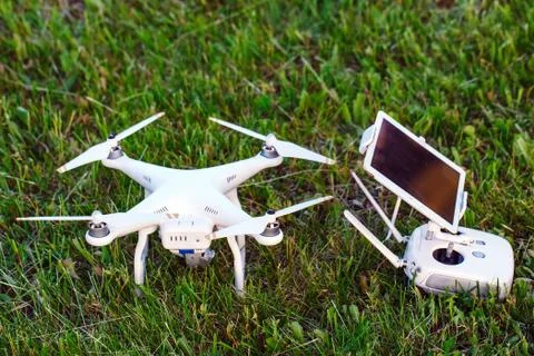 Drone quad copter with high resolution digital camera and its remote control pad Stock Photos