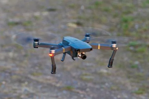 Drone quad copters with high resolution digital camera flying Foto stock