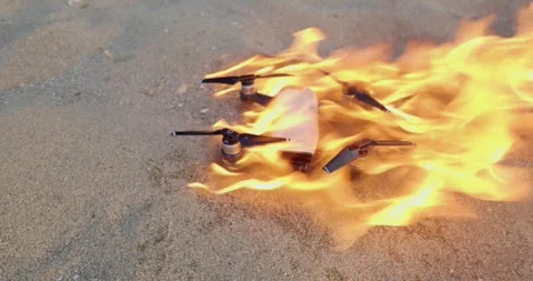 Drone Quadcopter burning on fire. Stock Footage 277608721
