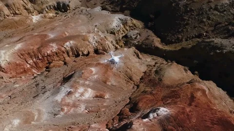 Drone quadcopter with digital camera and sensors flying while flying over the Stock Footage 255932150