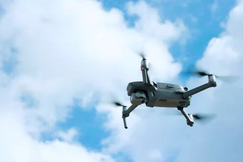 Drone quadcopter with digital camera in the sky - Photo Stock Photos