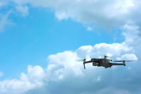 Drone quadcopter with digital camera in the sky - Photo Stock Photos