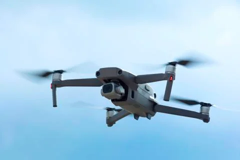 Drone quadcopter with digital camera in the sky - Photo Stock Photos