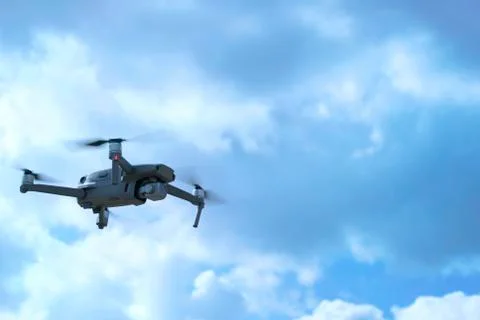 Drone quadcopter with digital camera in the sky - Photo Stock Photos