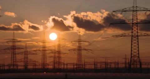 Drone (Quadcopter) flying in front of a sundown Stock Footage 77203462