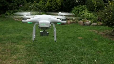 Drone Quadcopter Hovering In The Air Stock Footage