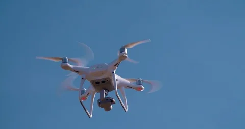 Drone Quadrocopter Flying in the sky Close-up shot 4K Stock Footage 93795412
