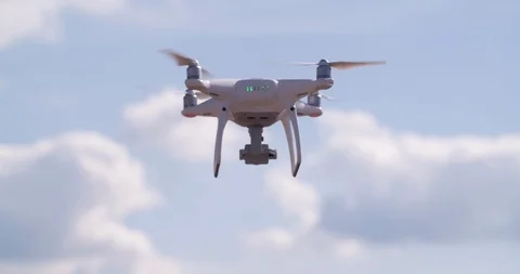 Drone Quadrocopter Flying in the sky Slow Motion Close-up shot Stock Footage 93794630
