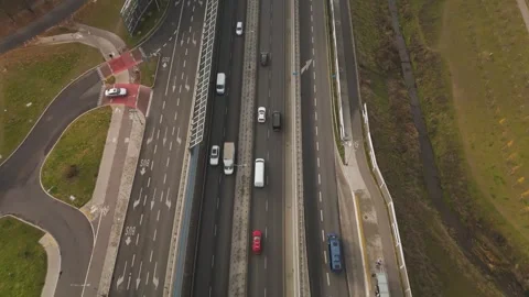 The drone quickly descends onto a busy road Video stock 296376392