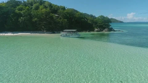 The drone quickly flies upward from a large boat Stock Footage 155333967