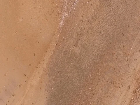 Drone quickly rises over Beach Stock Footage 82574807