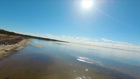 Drone racing view. Low Fly over water coast line. Dynamic shot Vídeos de archivo 106521883