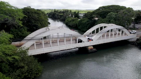 Drone rainbow bridge fly up camera tilt down with cars Stock Footage 170032281