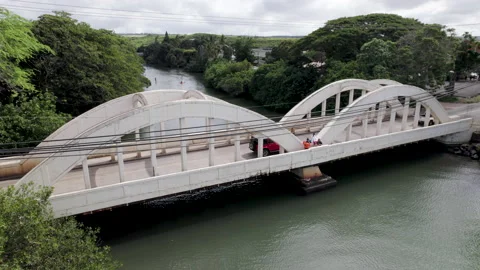 Drone rainbow bridge fly down camera tilt up close up Stock Footage 170024368