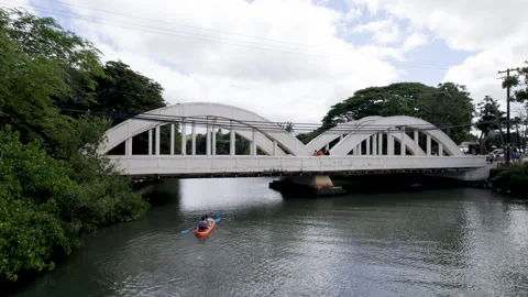 Drone rainbow bridge static shot with Kayak Stock Footage 170033572